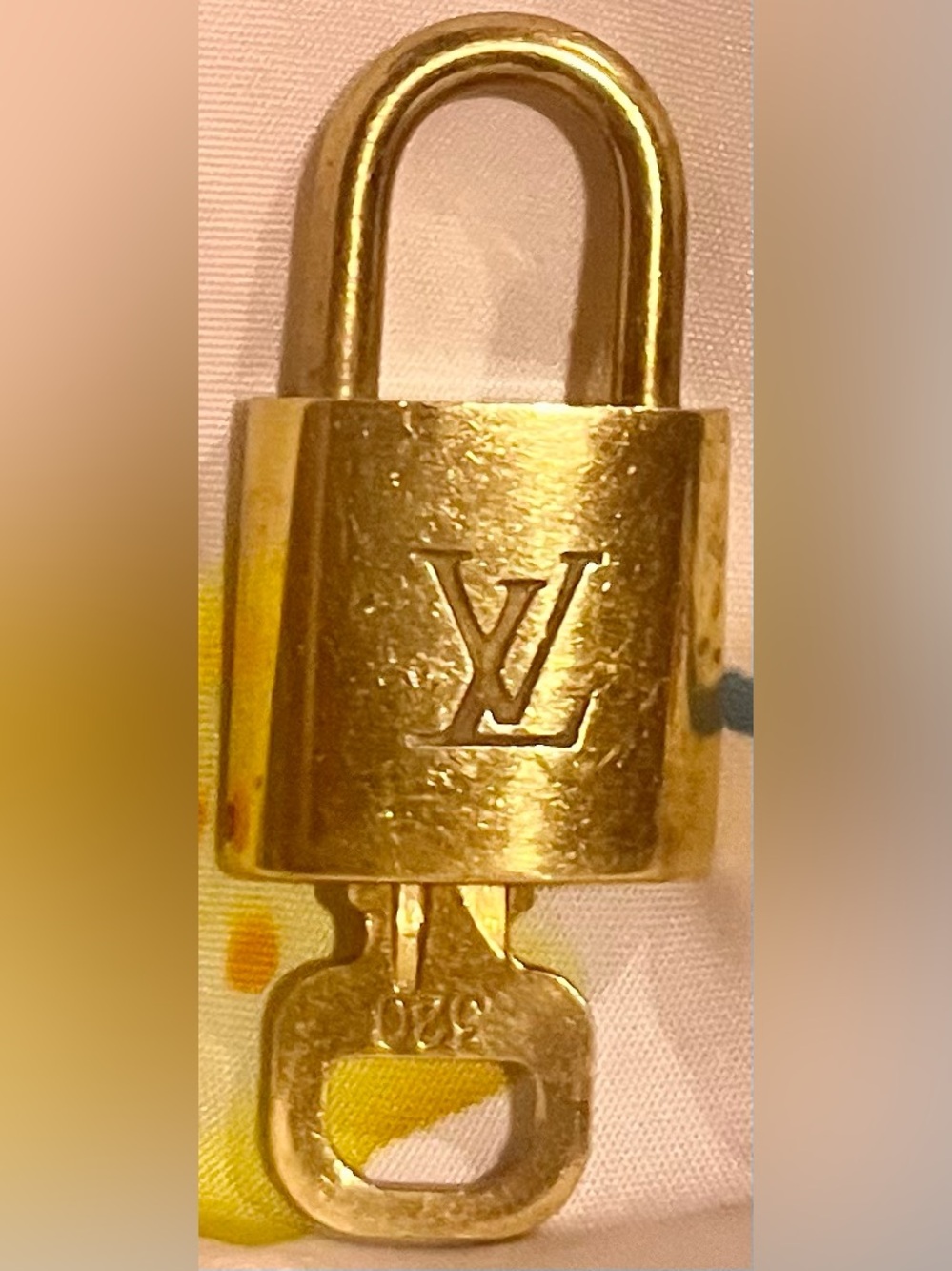 Louis Vuitton padlock and key